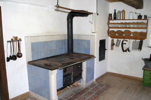 The stovepipes in a wood-burning stove in a farm museum