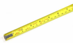 A tape measure calibrated in both feet/inches and meters/centimeters
